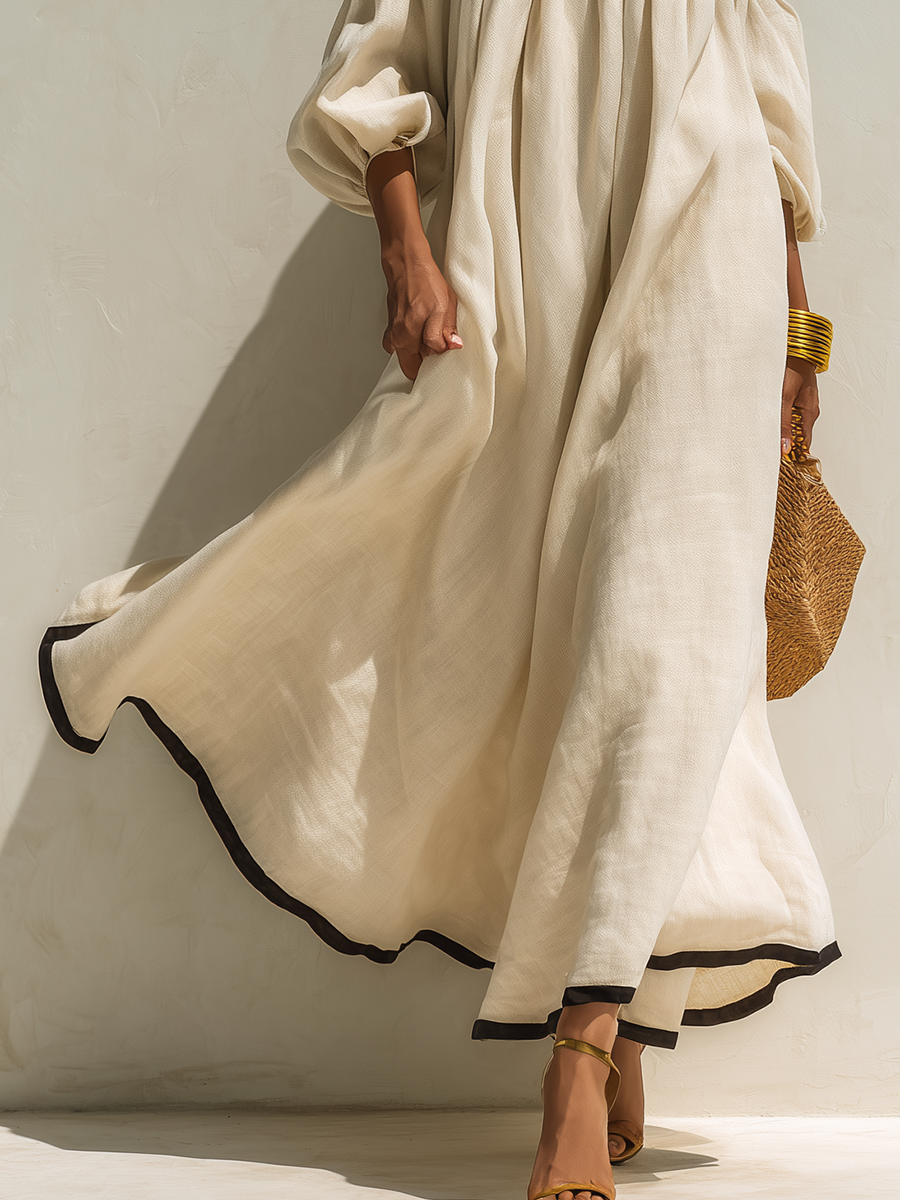 Robe maxi en coton-lin beige, sans épaules et à coupe ample avec des blocs de couleur.