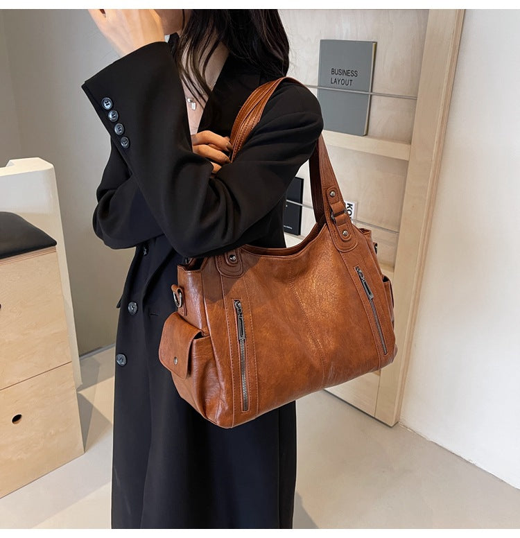 NOEMIE™ - Sac fourre-tout en cuir classique