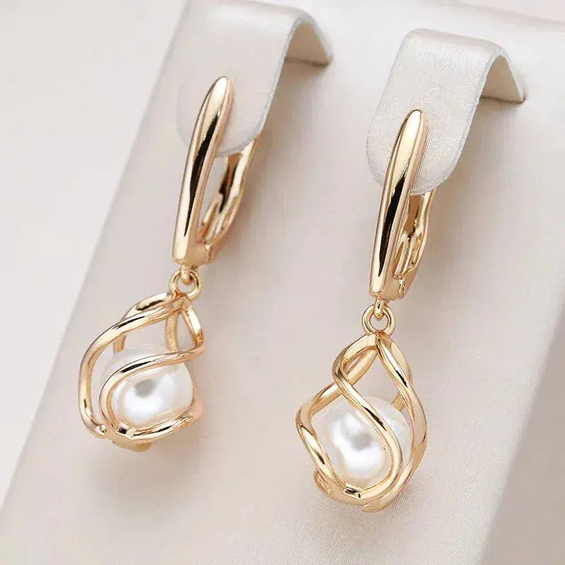 Boucles d'oreilles élégantes en perles dorées